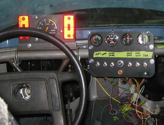 Illustration for article titled Welcome To Low-Budget Race Car Wiring Hell!